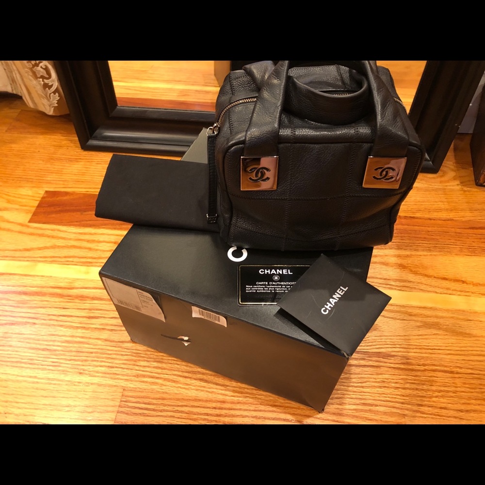 Authentic Chanel quilted bowler black caviar bag